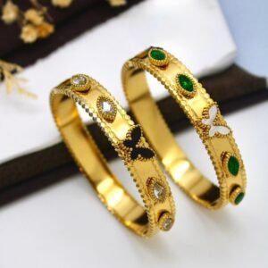 plain golden bracelet with small stones and a butterfly centerpiece